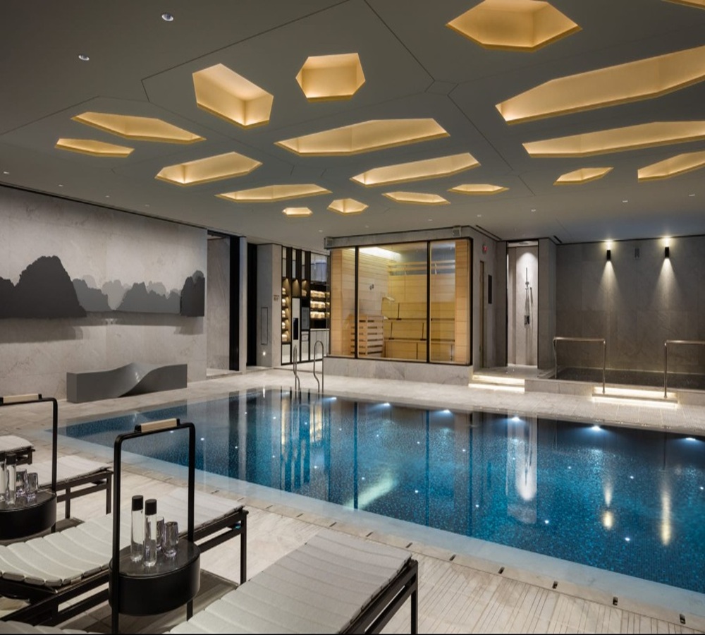 Vibrant evening atmosphere at the bustling Jongno Pocha street in Seoul with people enjoying outdoor dining and drinks under lights