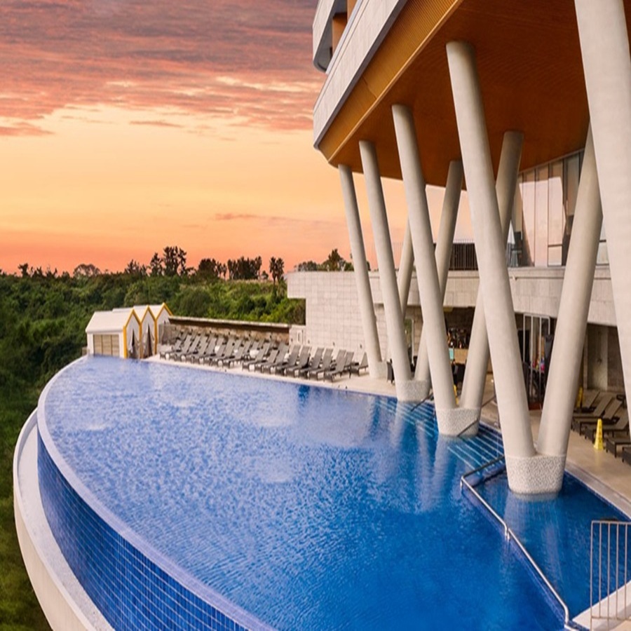 Hidden Cliff Hotel Jeju 47-meter heated infinity pool overlooking the subtropical canyon and forest