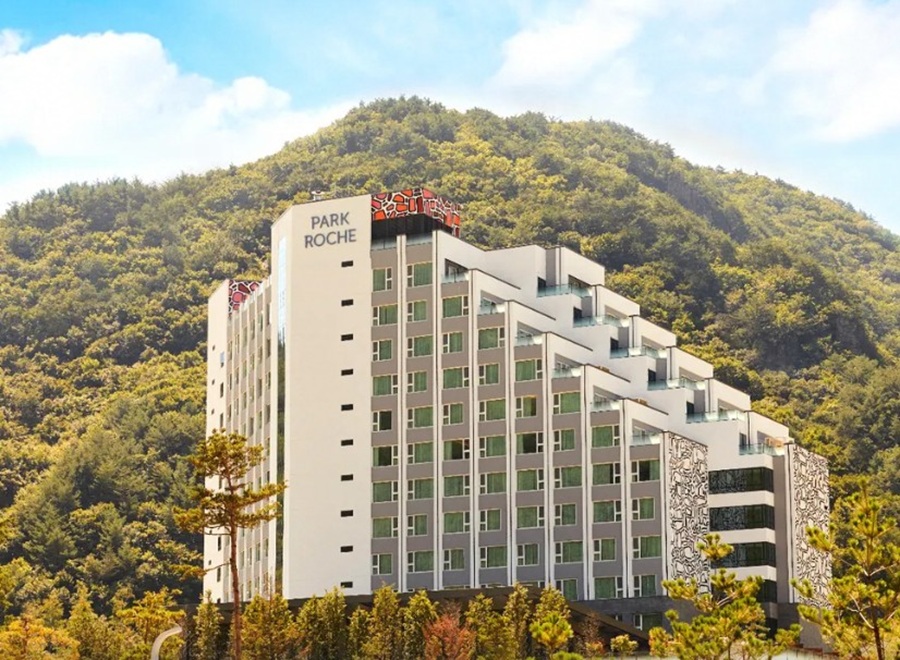 Exterior architecture of Park Roche Resort and Wellness nestled against Mount Gariwang in Jeongseon