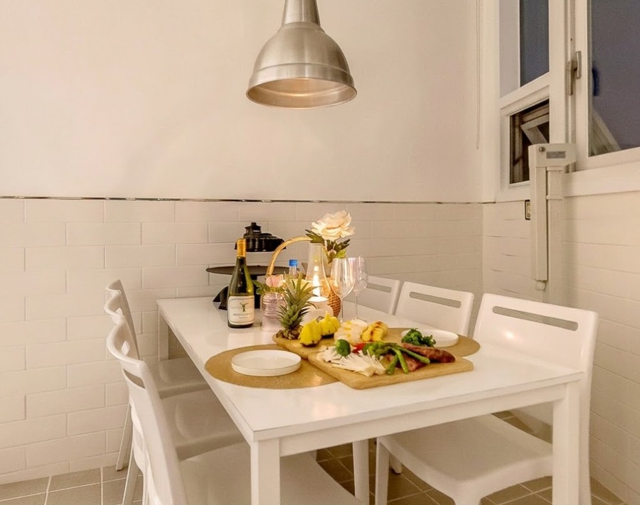 Private terrace barbecue lounge overlooking the evening ocean horizon at March Blue Pool Villa in Pohang Korea